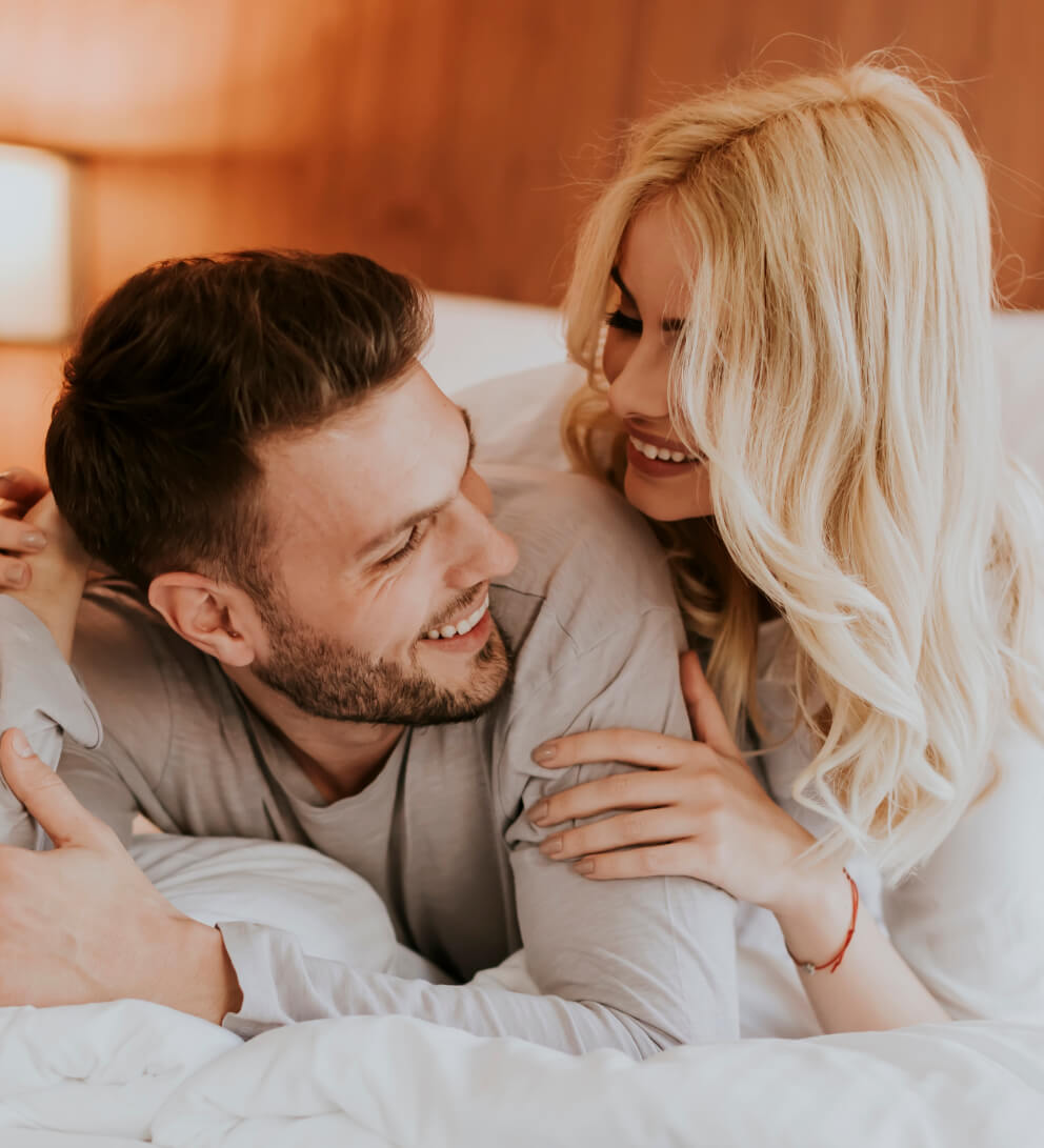 mob-romantic-couple-in-love-lying-in-bed-together