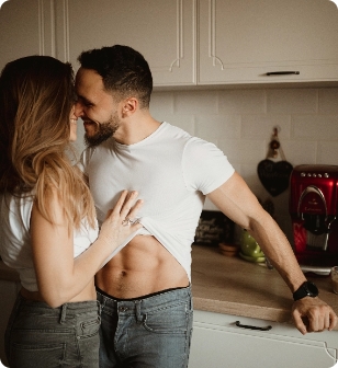 young-sexy-couple-kissing-in-the-kitchen